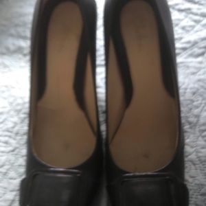 Cole Haan black buckle heels